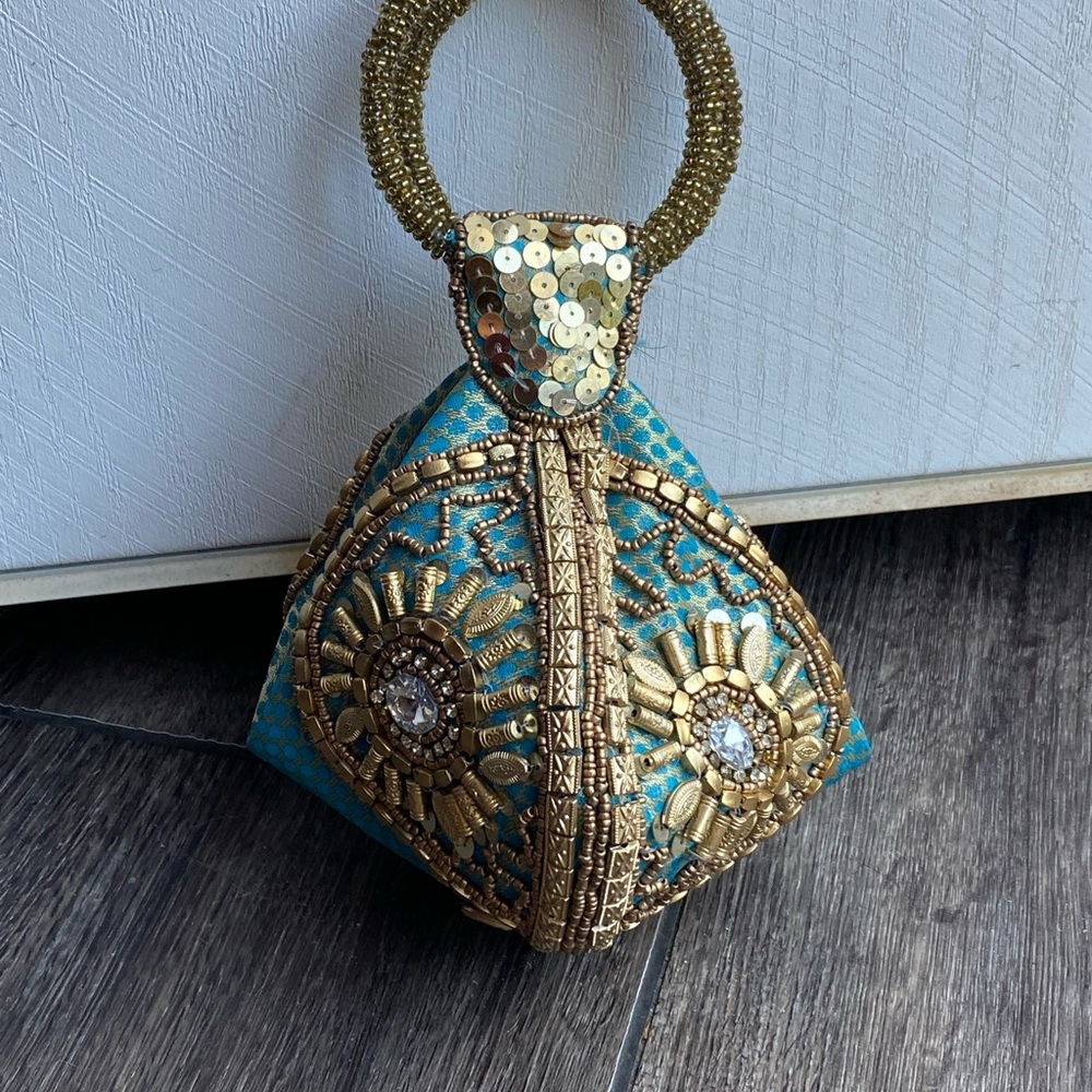 Fortune Cookie Purse
Beaded Zip Snap Closure
Gold Sequin Wristlet Clutch
Bag